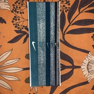 6 pk Nike Headbands *small stain on one of them*